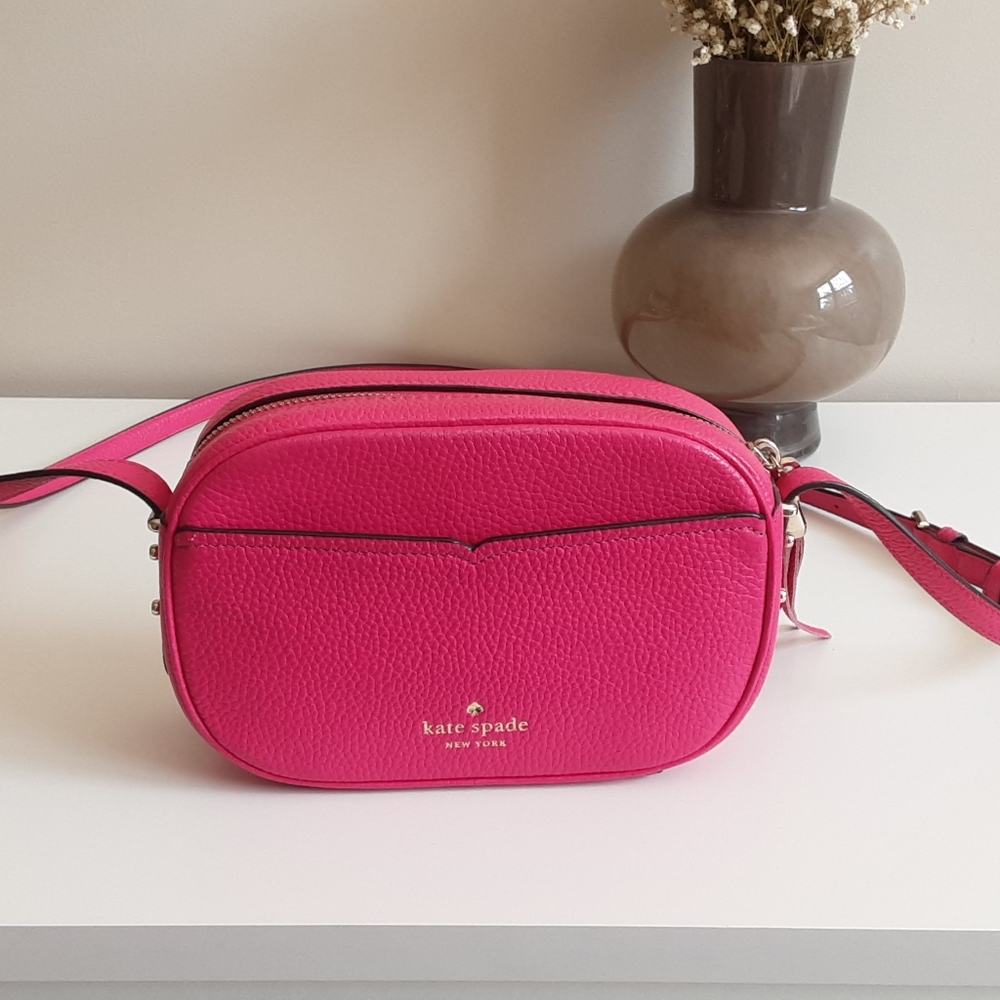 A beautiful gently used Kate Spade hot pink crossbody!